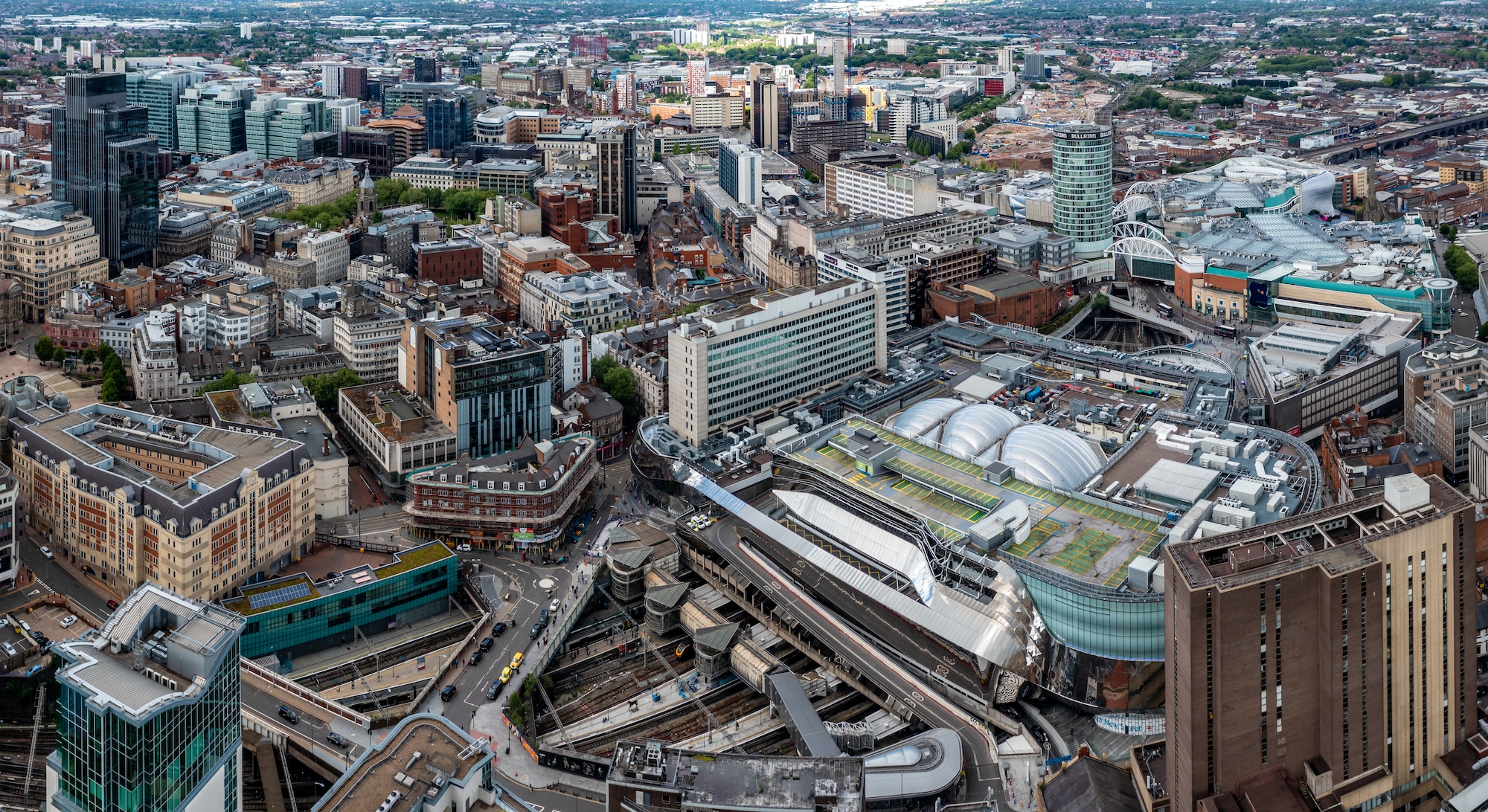 Aerial view of the buildings and architecture of a Birmingham city centre cityscape skyline